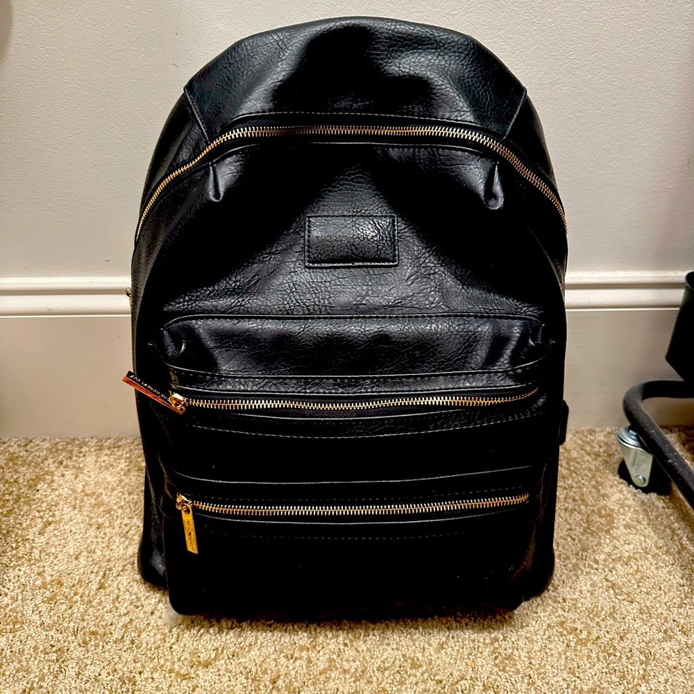 The Honest Co black leather diaper bag backpack